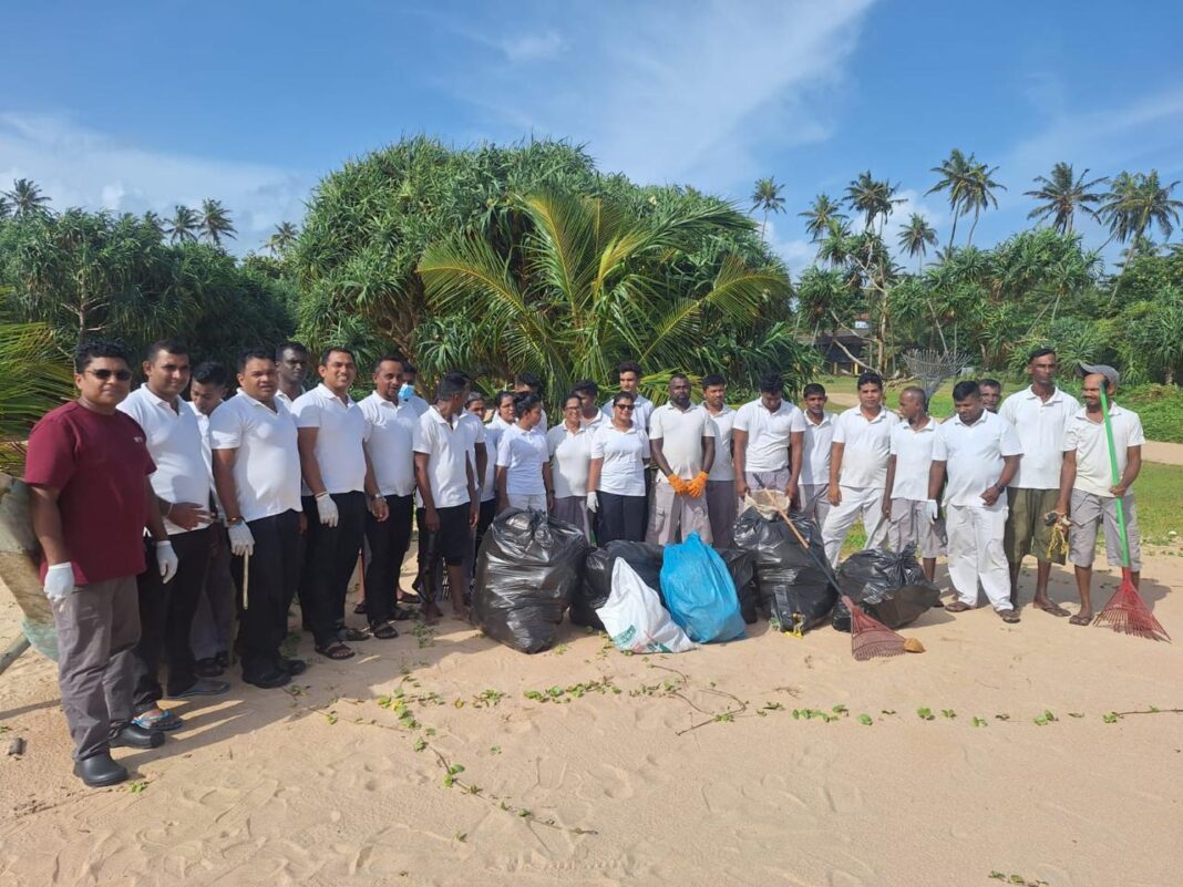 Beach clean up by staff of Rock Villa and Muse by Nyne